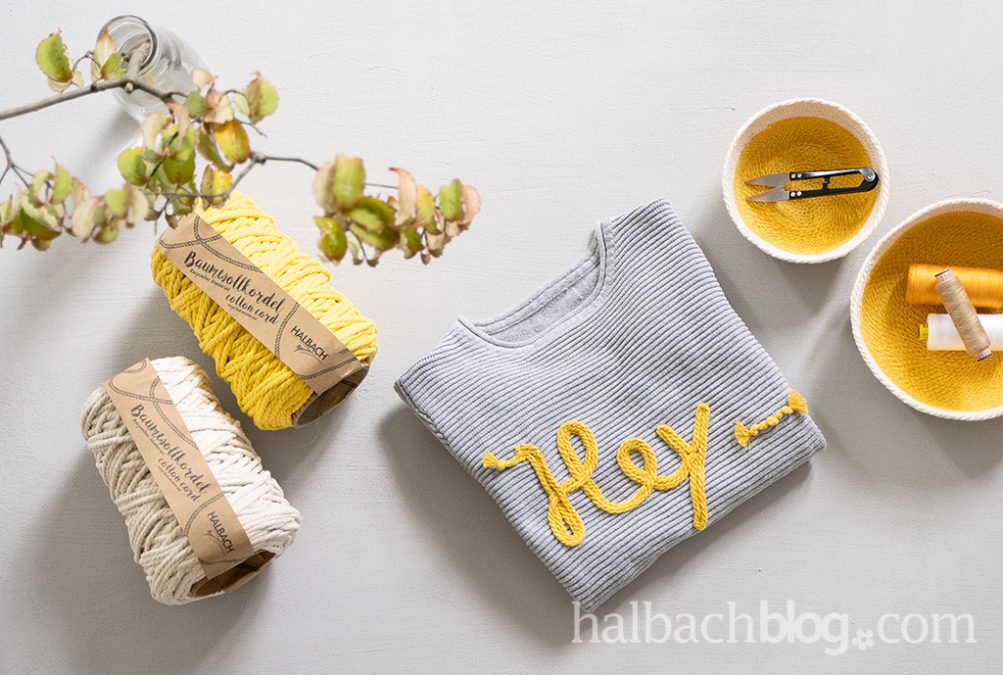 Statement Pulli “Hey”